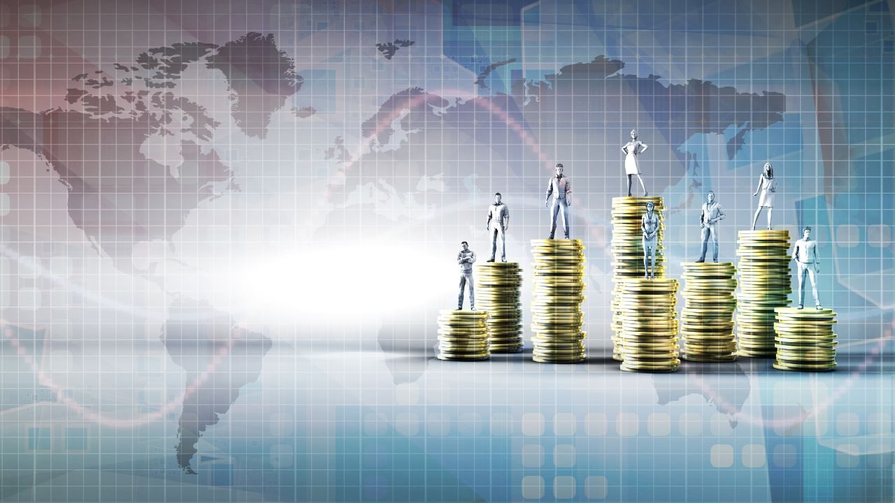 Stacked gold coins of increasing height with tiny businesspeople standing on each stack against a world map backdrop, illustrating wealth and growth.